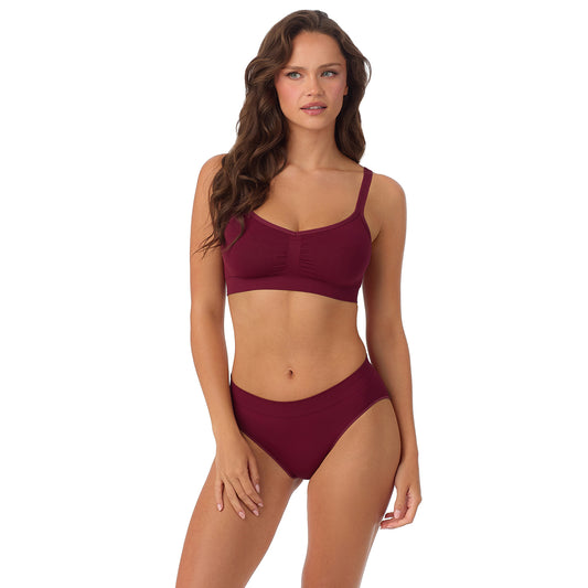 A Lady Wearing Seamless Comfort Bralette - Currant facing front view