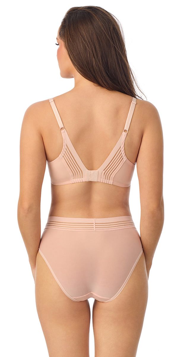 A lady wearing a  Pale Peach Second Skin Back Smoother