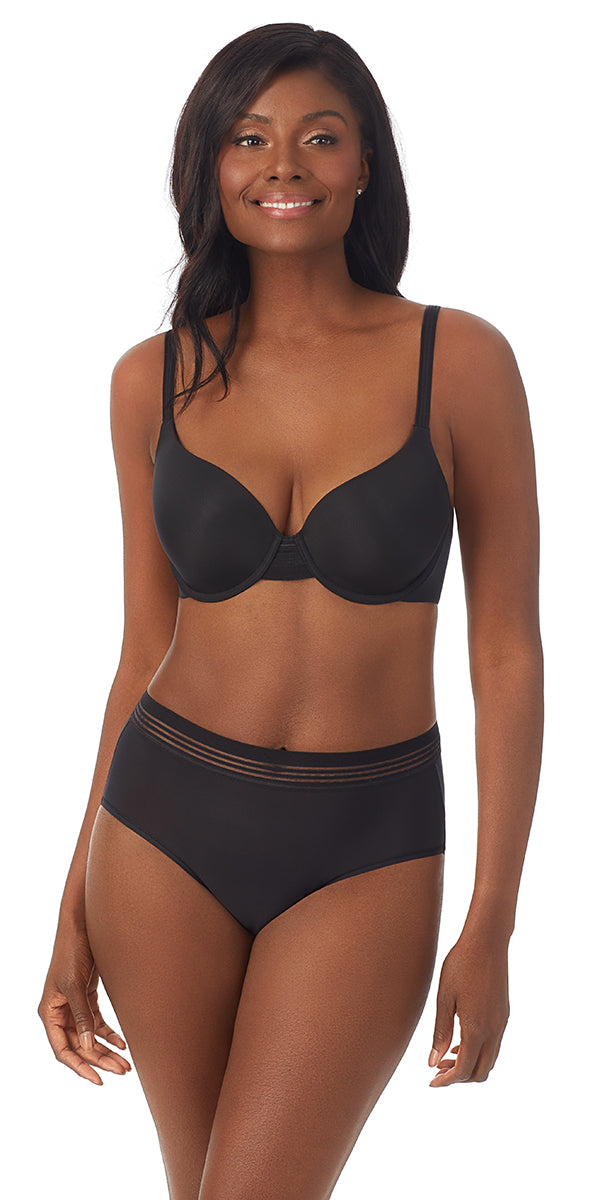 A lady wearing a black second skin back smoother.