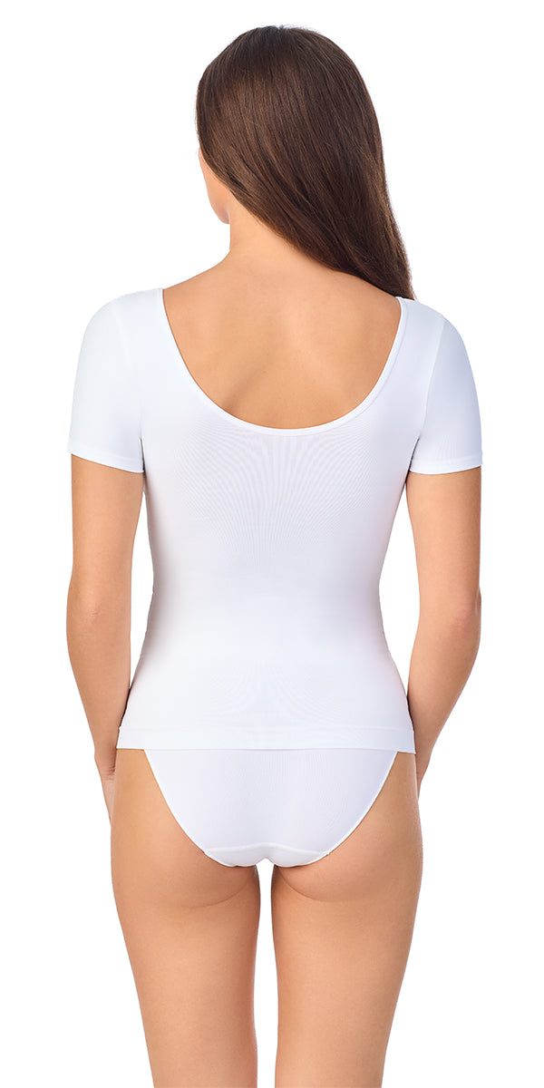 A lady wearing white Seamless Comfort Tshirt