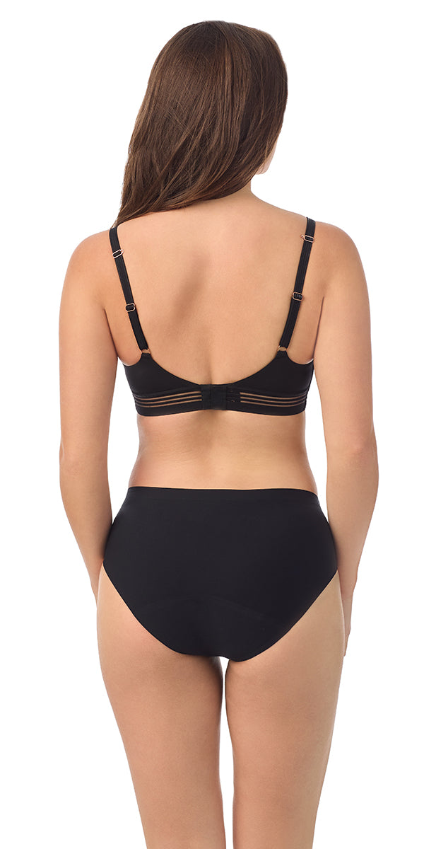 A lady wearing the Second Skin Wireless bra in Black.