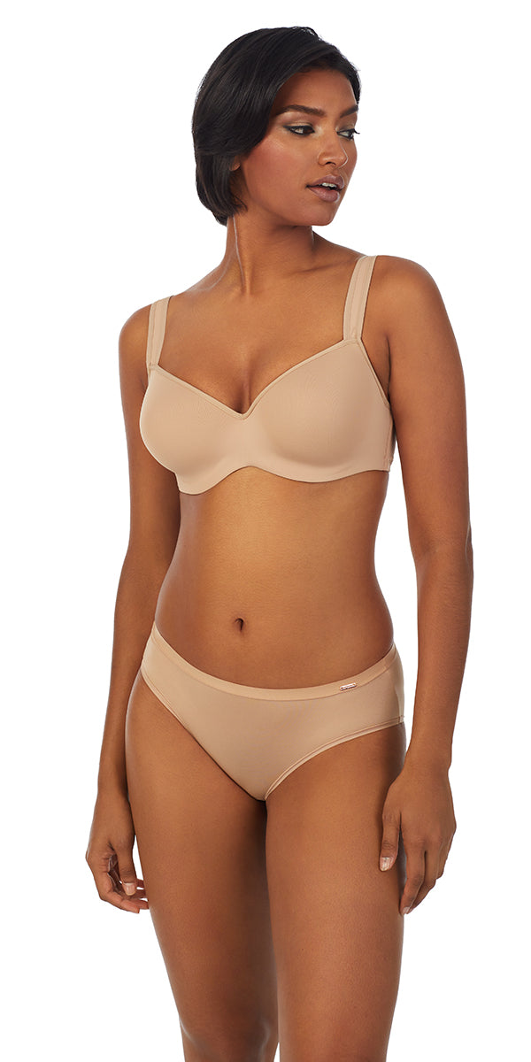 A lady wearing a natural dream tisha bra.