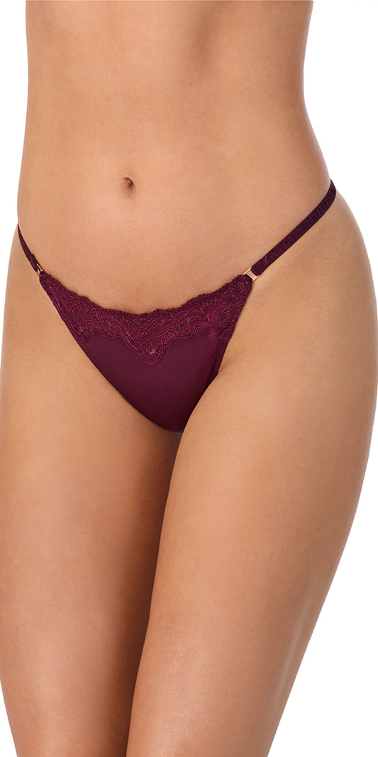 A lady wearing blackberry Lace Allure Micro Thong