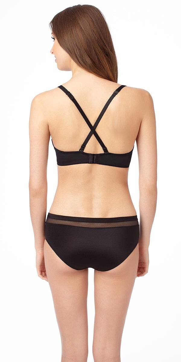 A lady wearing a almond infinite possibilities plunge bra.