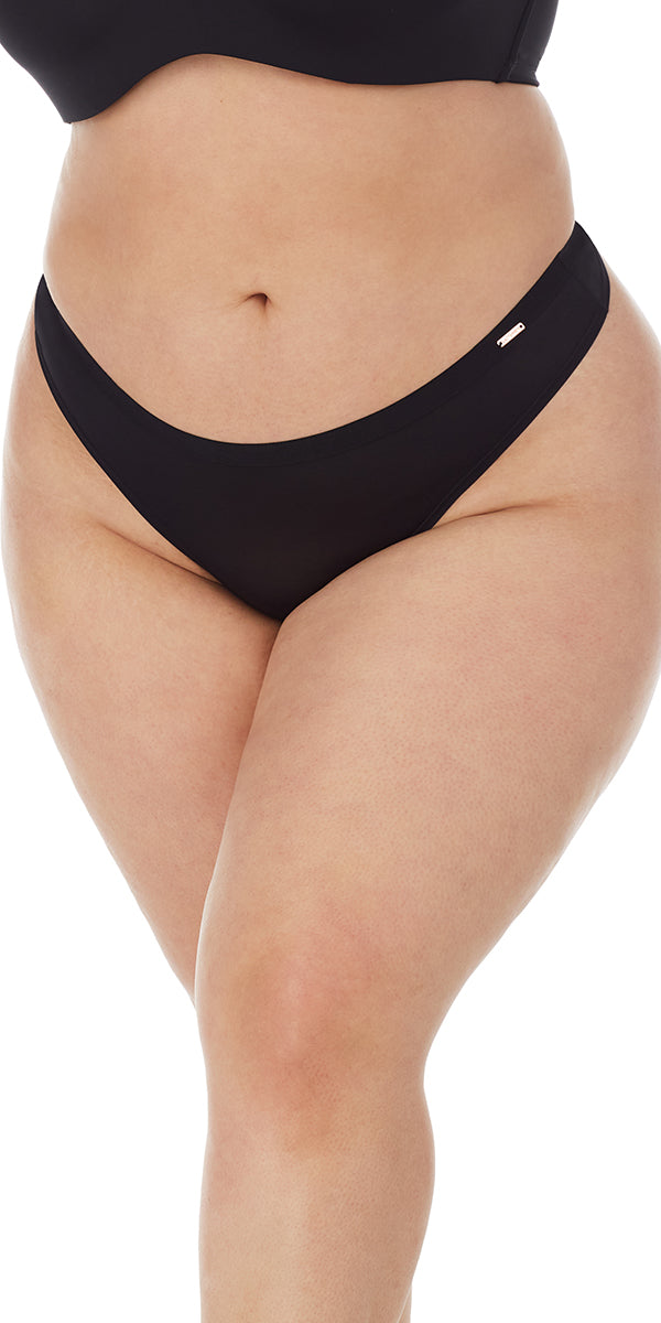 A lady wearing a black infinite comfort thong.