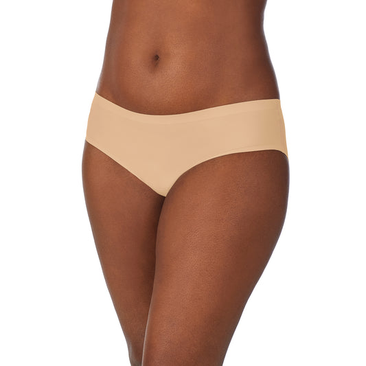 A lady wearing a natural smooth shape leak resistant hipster.