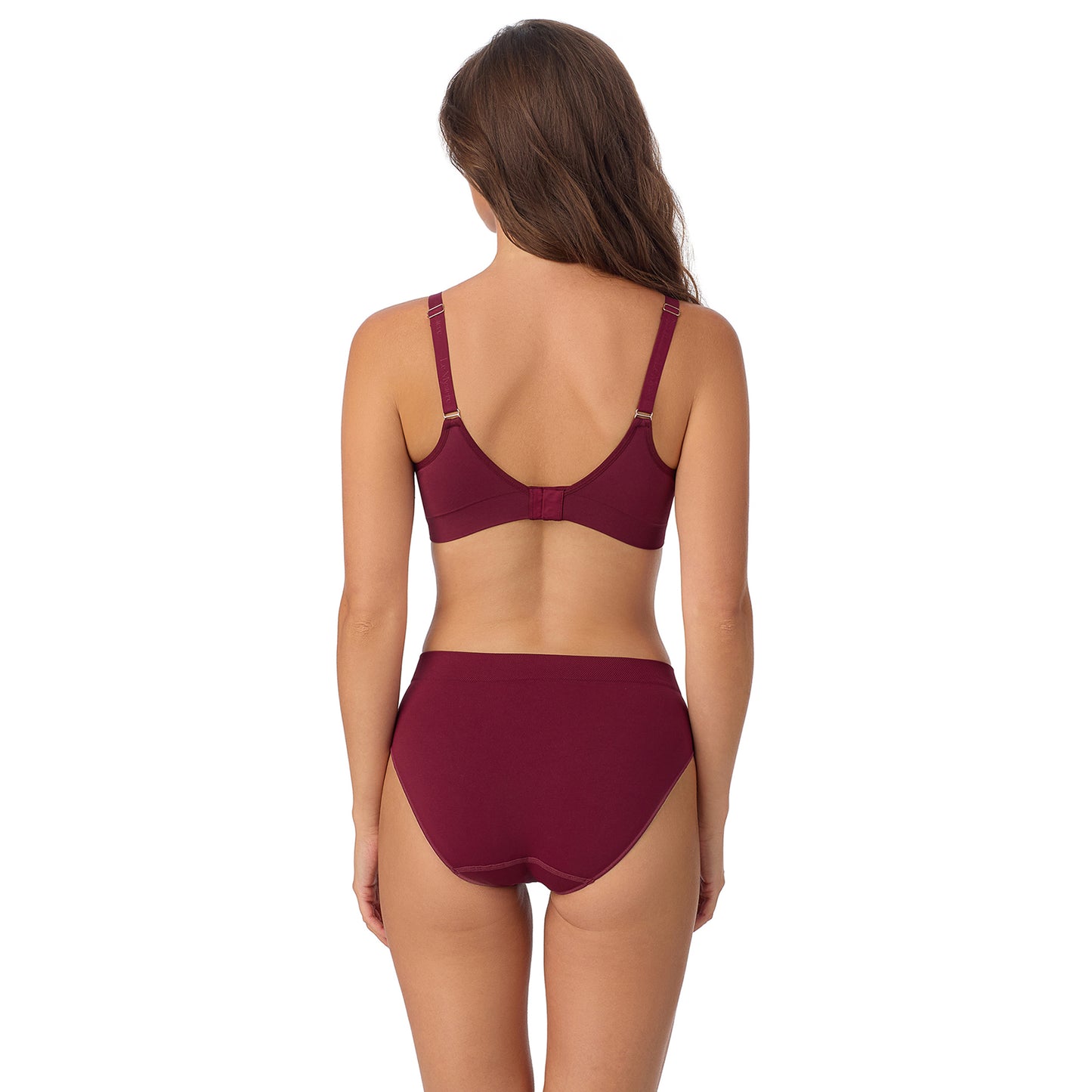A Lady Wearing Seamless Comfort Unlined - Currant facing back view in a straight standing pose looking slightly to the side