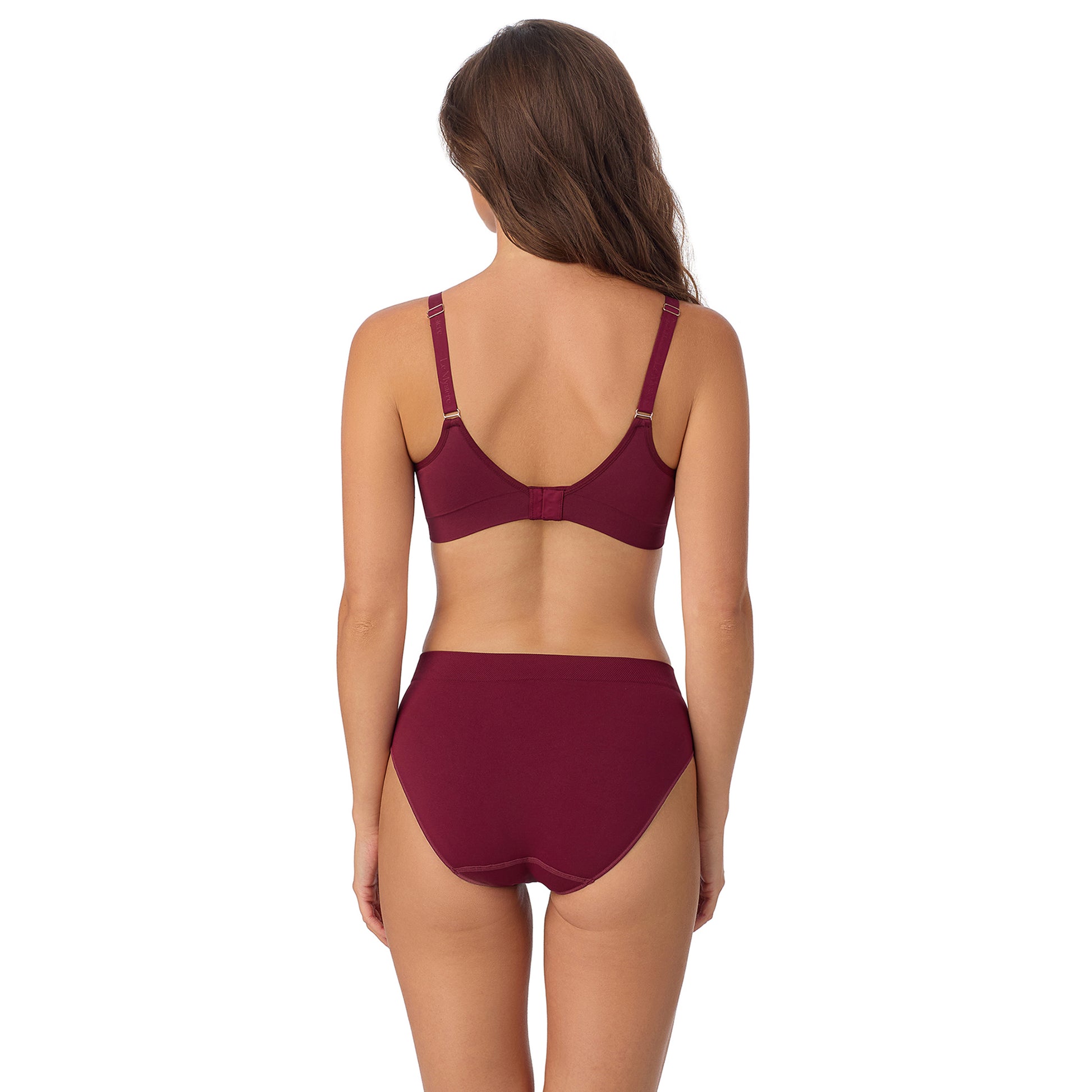 A Lady Wearing Seamless Comfort Unlined - Currant facing back view in a straight standing pose looking slightly to the side