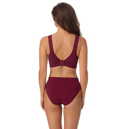 A Lady Wearing Seamless Comfort Wireless Back Smoother - Currant posing with a back view standing pose
