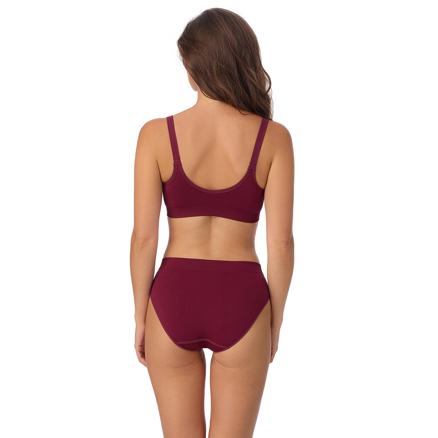 A Lady Wearing Seamless Comfort Bralette - Currant facing back view