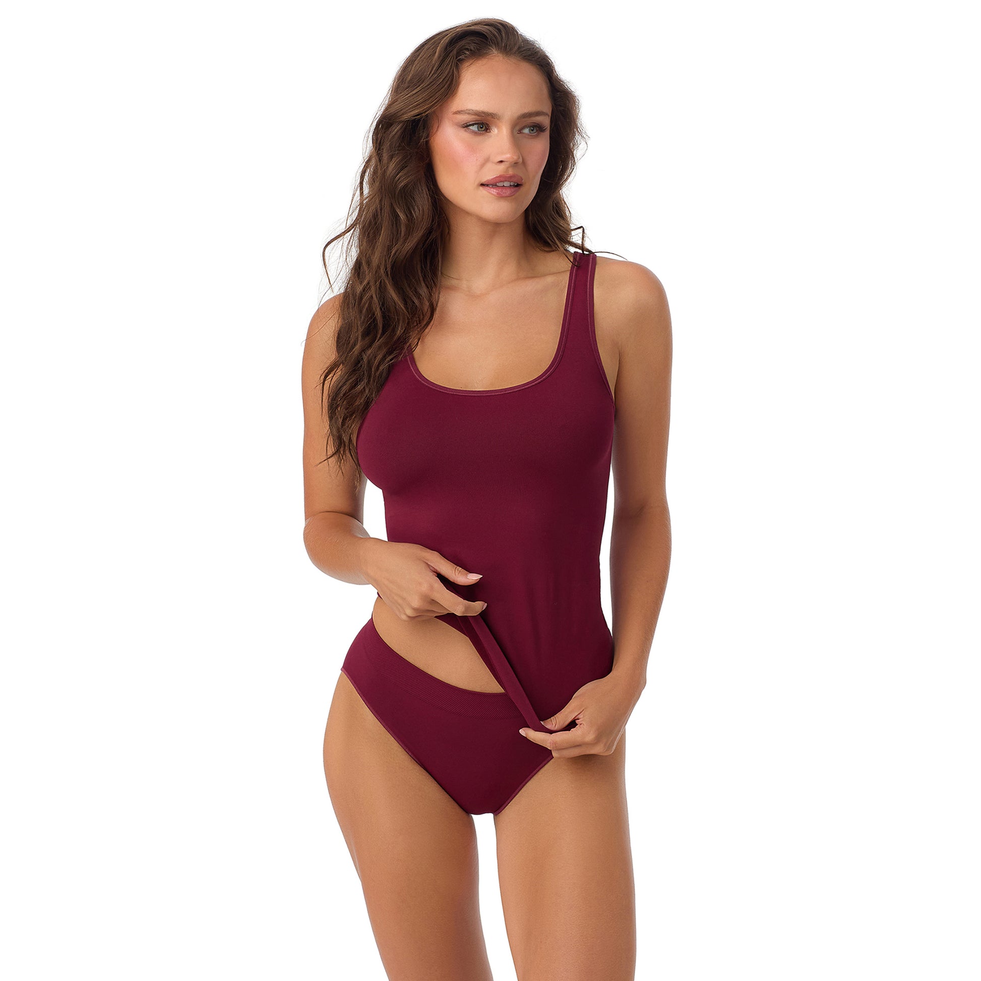 A Lady Wearing Seamless Comfort Tank - Currant facing front with a standing pose