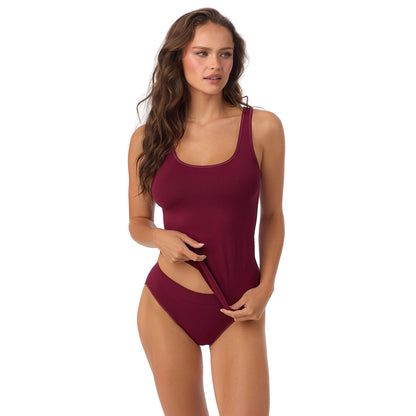 A Lady Wearing Seamless Comfort Tank - Currant facing front with a standing pose