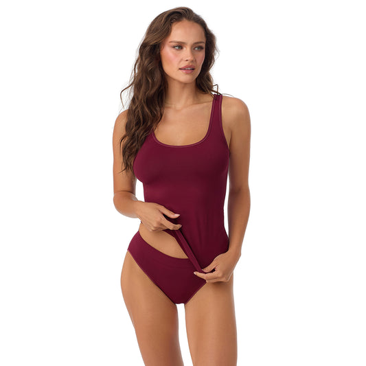 A Lady Wearing Seamless Comfort Tank - Currant facing front with a standing pose