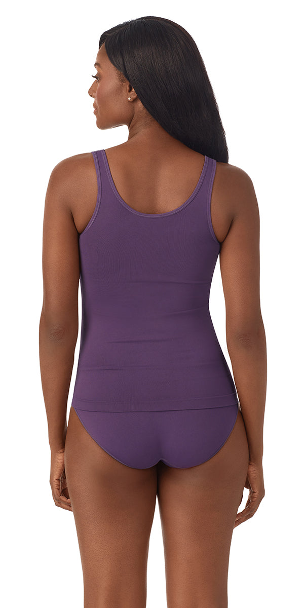 A lady wearing dark plum Seamless Comfort Tank