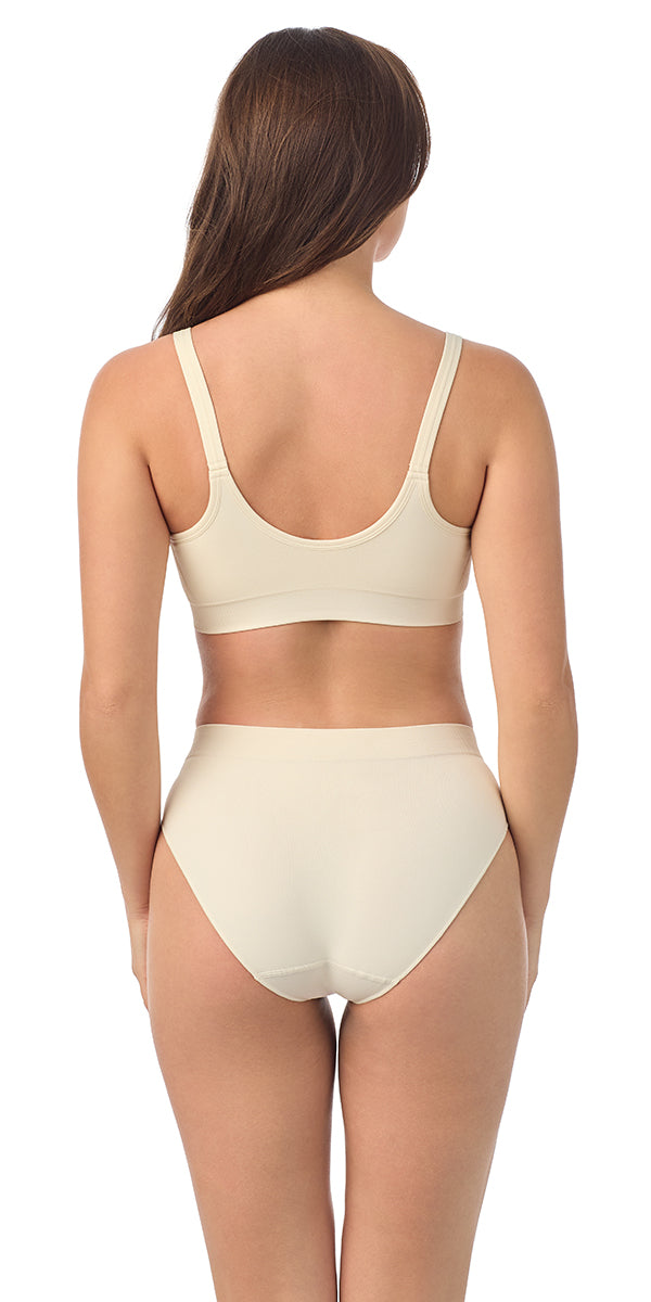 A lady wearing white Seamless Comfort Bralette 