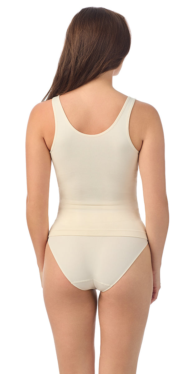 A lady wearing white Seamless Comfort Tank