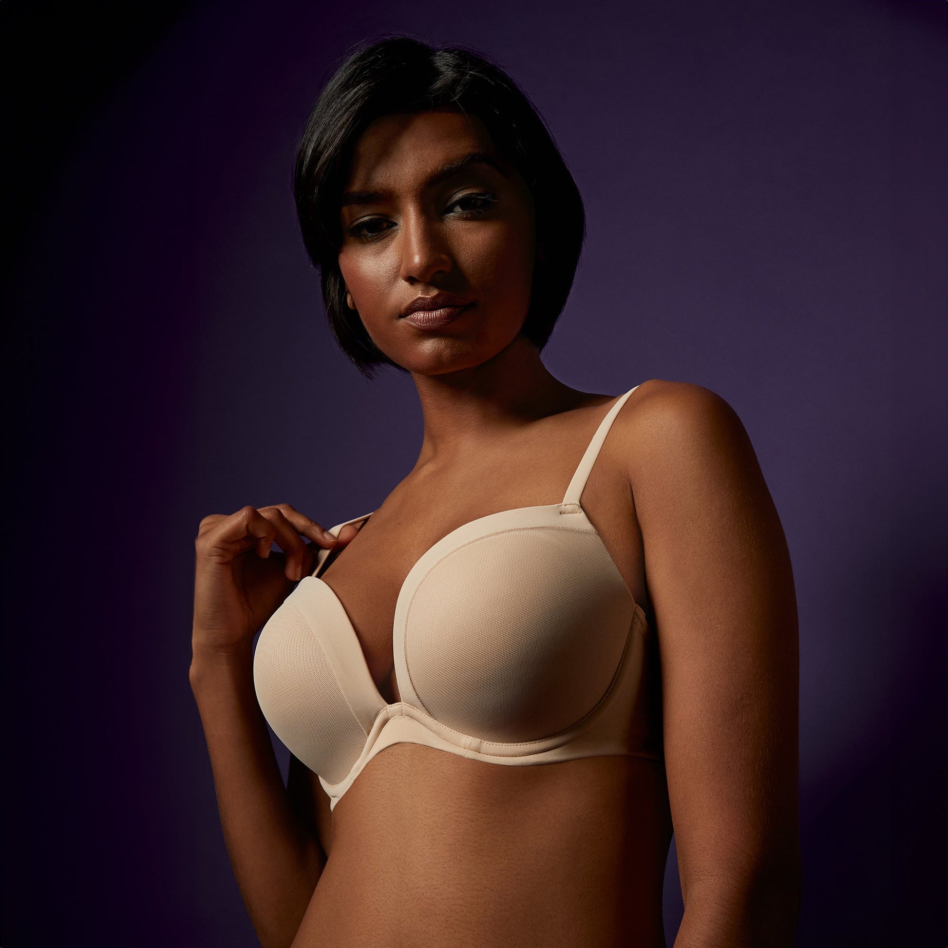 A lady wearing Infinite Possibilities Plunge Bra in Almond