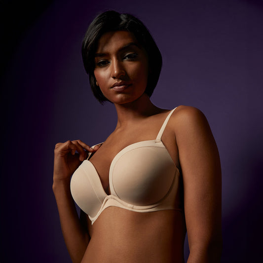 A lady wearing Infinite Possibilities Plunge Bra in Almond