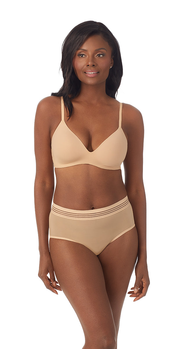 A lady wearing a natural second skin wireless bra.
