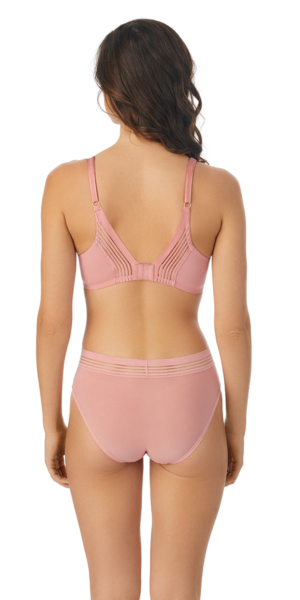 A lady wearing  pink Second Skin Back Smoother