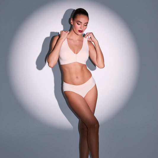 A lady wearing Seamless Comfort Front Close - Soft Shell spotlighted 