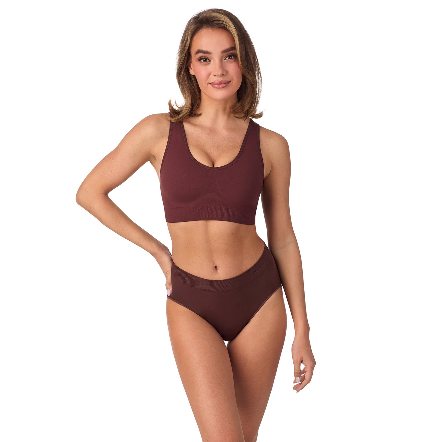 A lady wearing Seamless Comfort Wireless Back Smoother - Deep Mahogany 