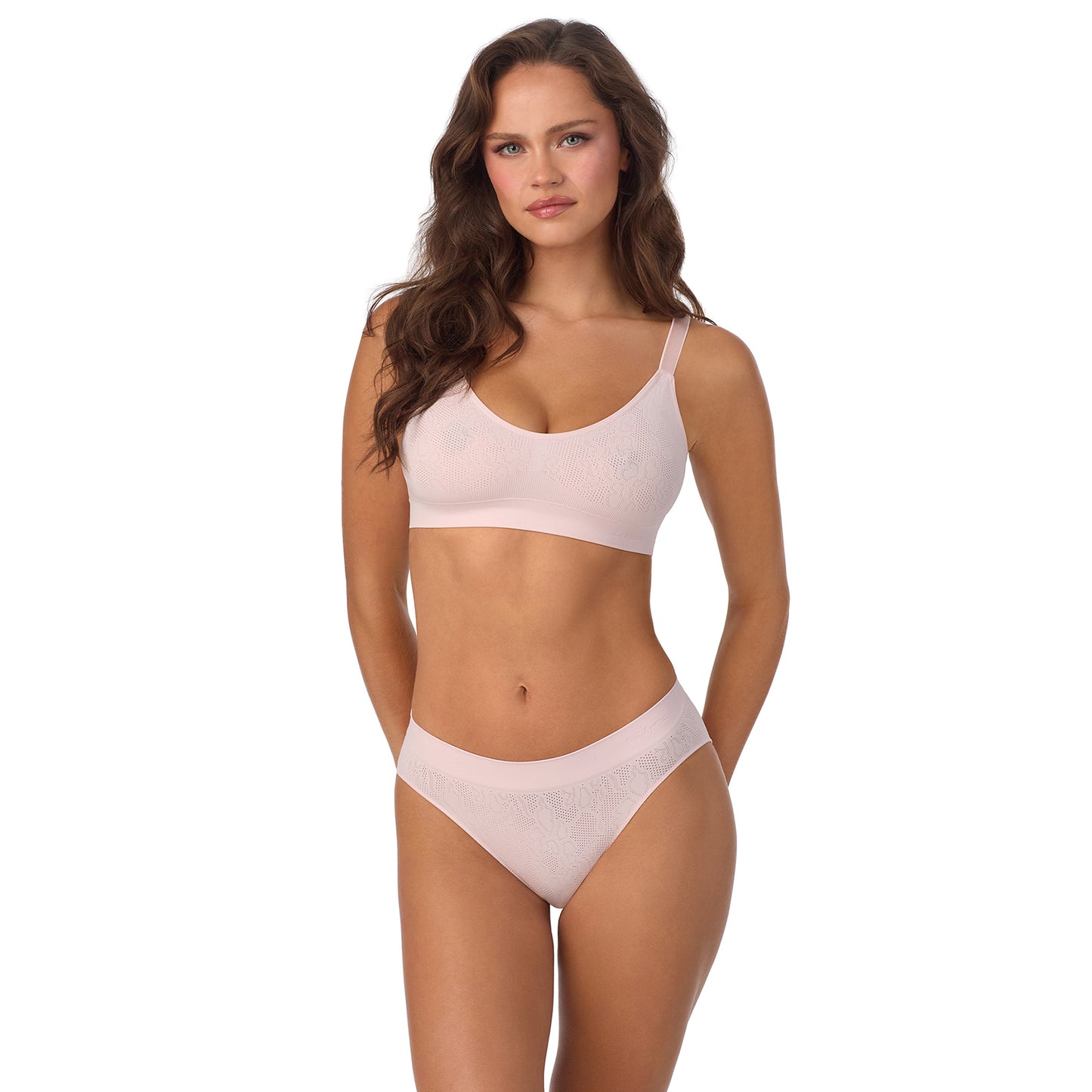 A lady wearing LaceKnit Seamless Wireless Bralette - Cherry Blossom 