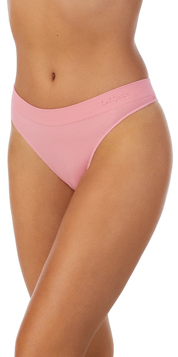A lady wearing coral sands seamless comfort thong