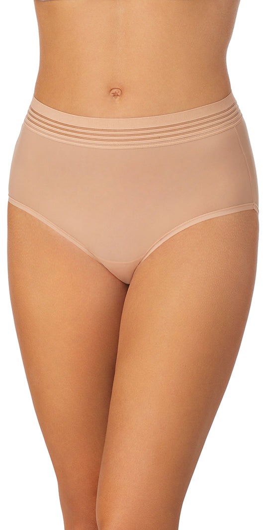 A lady wearing a natural second skin brief.