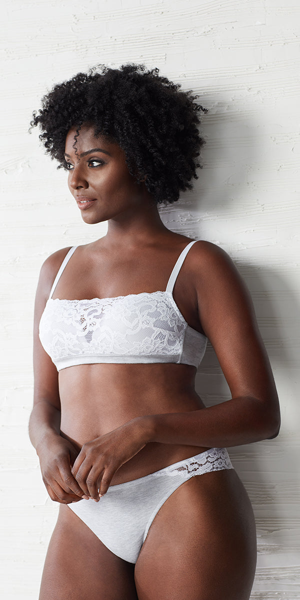 A lady wearing a heather grey cotton touch wireless bra.