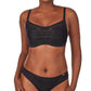 A lady wearing a black active balance sport bra.
