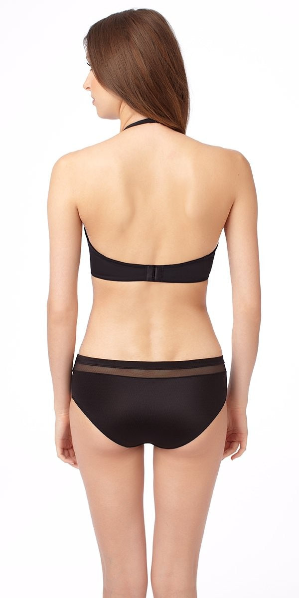 A lady wearing a almond infinite possibilities plunge bra.