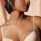 A lady wearing a sahara linguine bra.