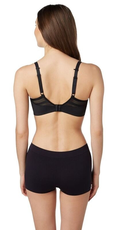 A lady wearing a black active balance sport bra.