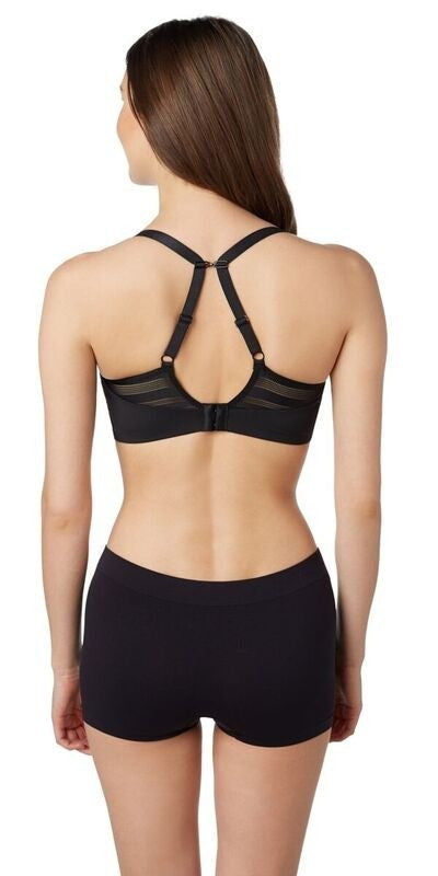 A lady wearing a black active balance sport bra.