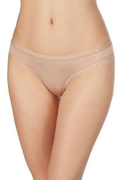 A lady wearing a natural infinite comfort thong