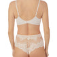 A lady wearing soft shell lace allure unlined.
